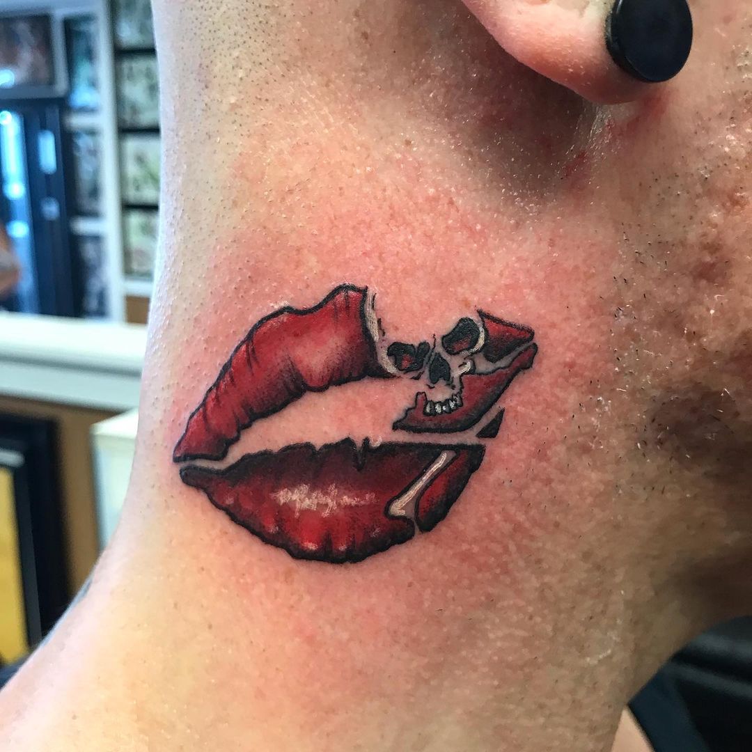 Deadly lips tattoo