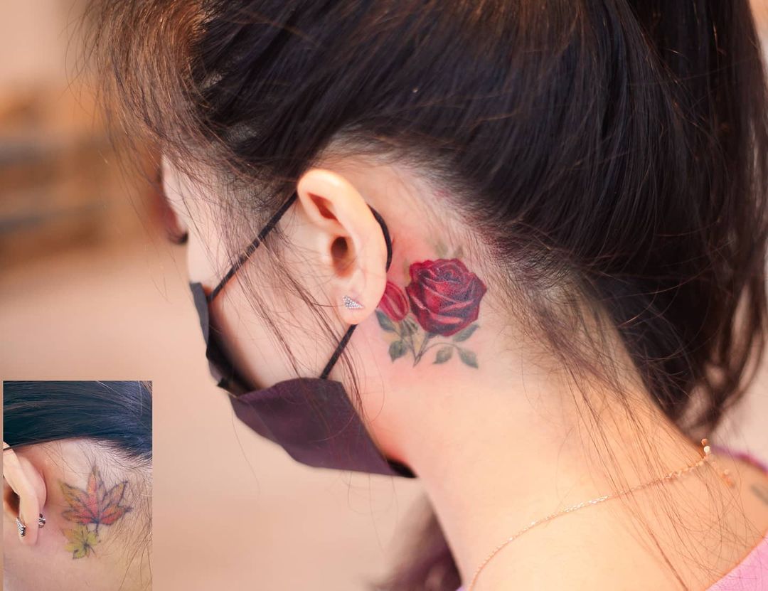 Roses as behind the ear tattoos
