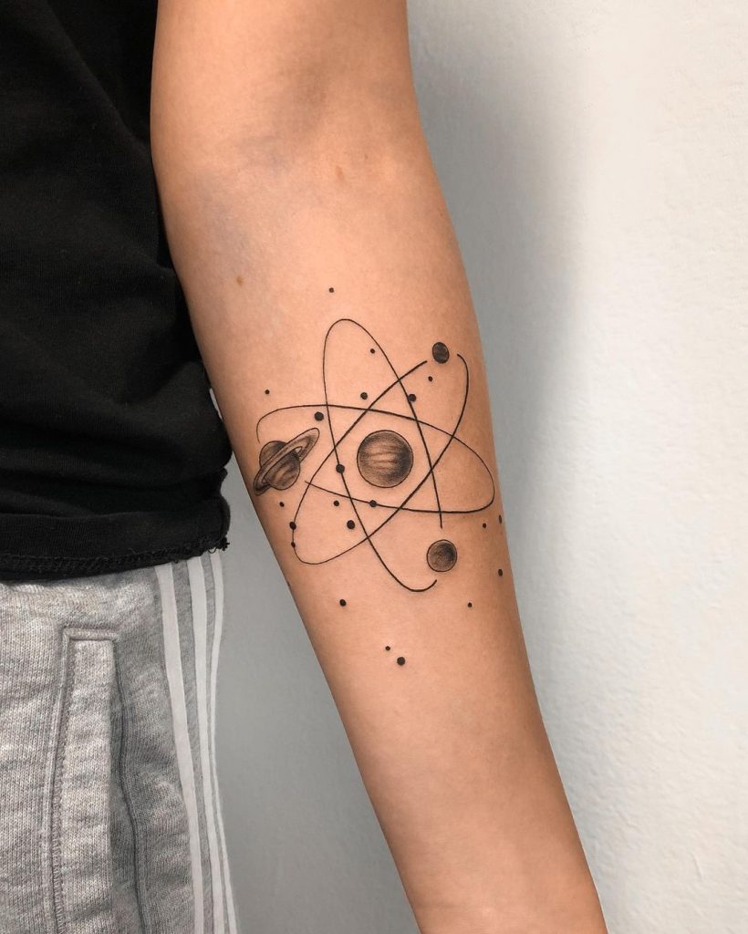 Planet tattoo on arm