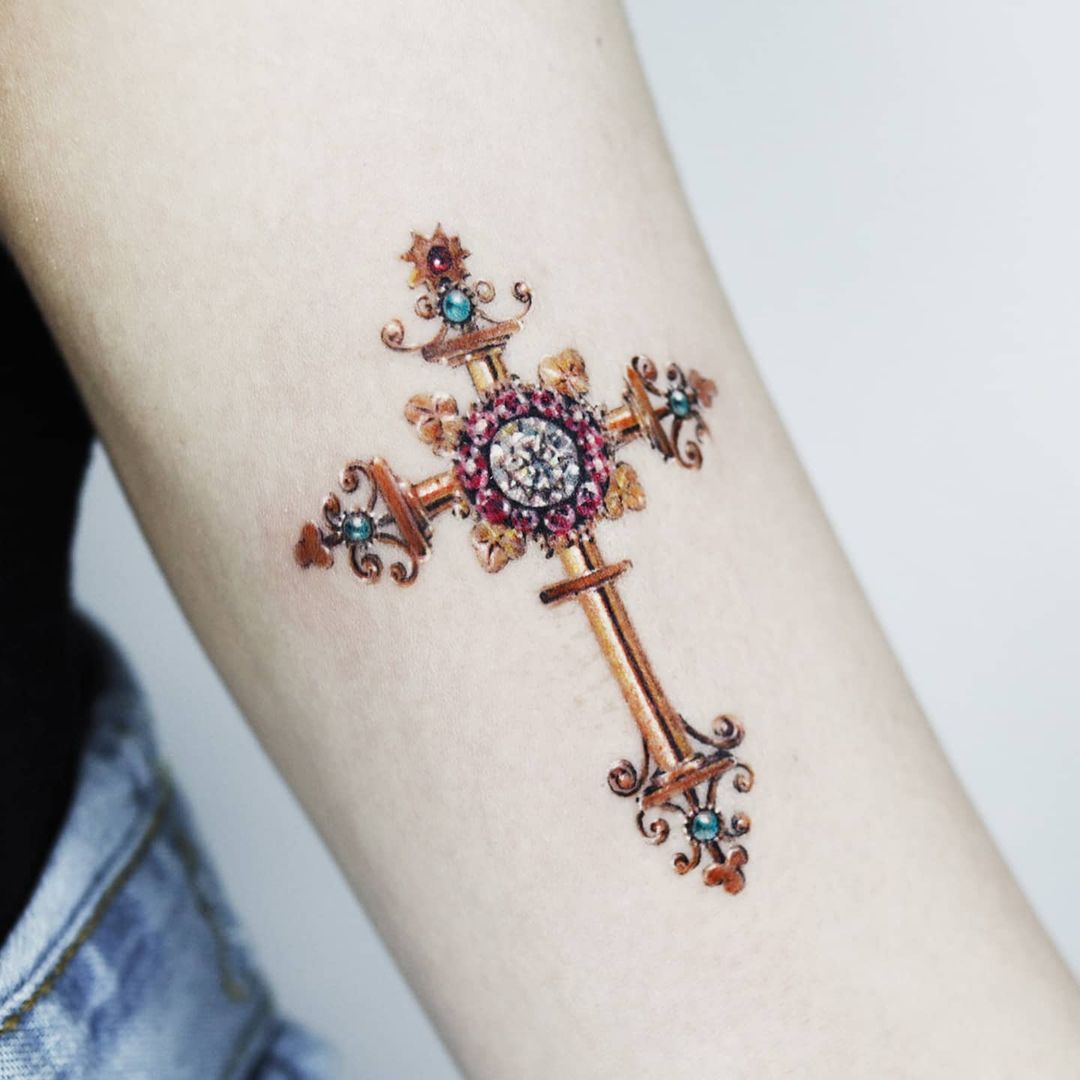 Shiny cross tattoos