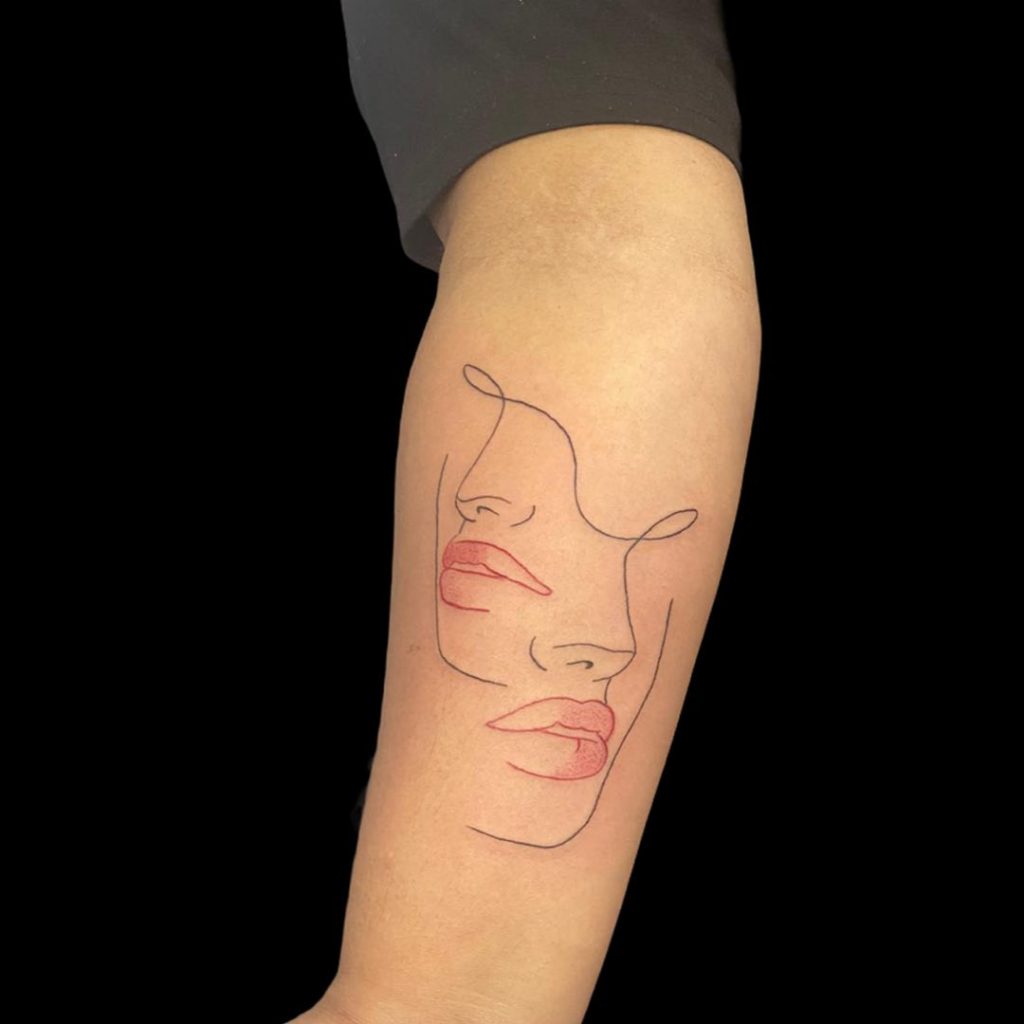 Junas-faced side tattoos