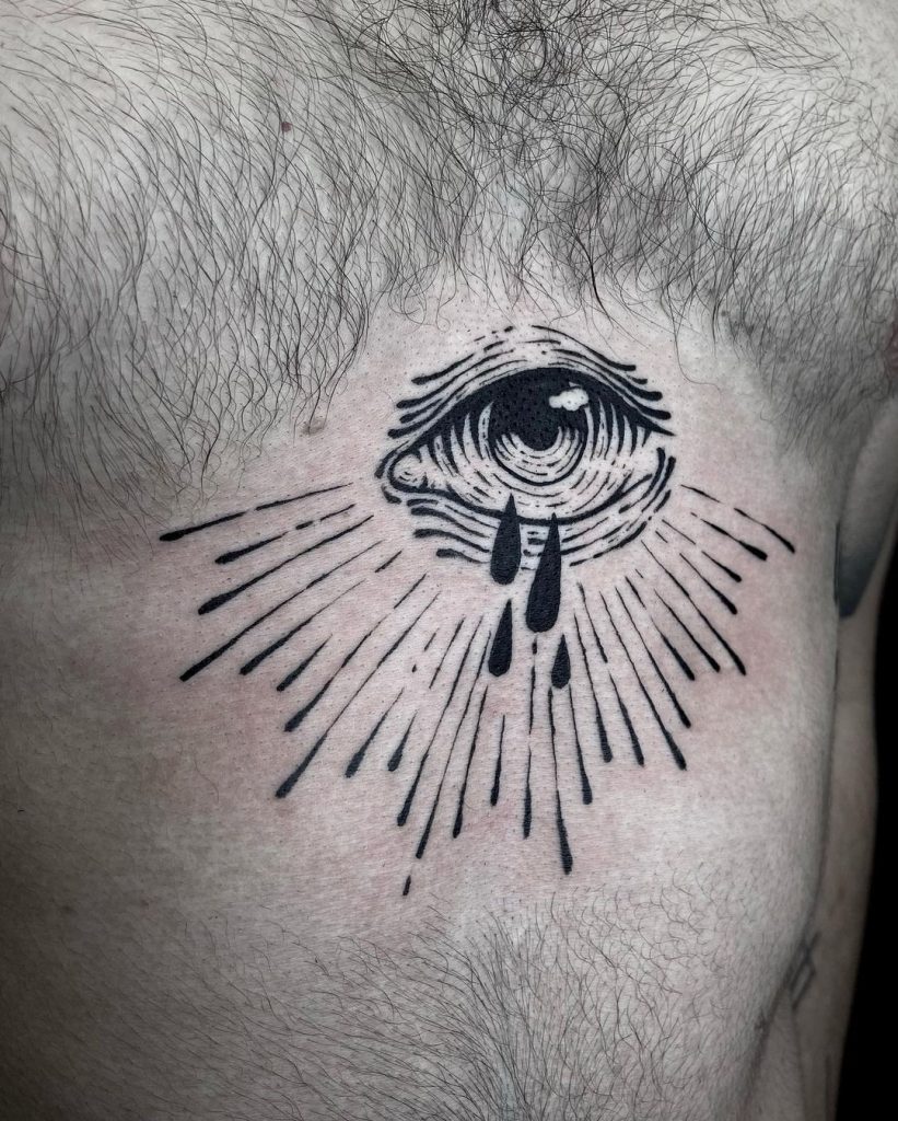Magnificent eye body art on the chest