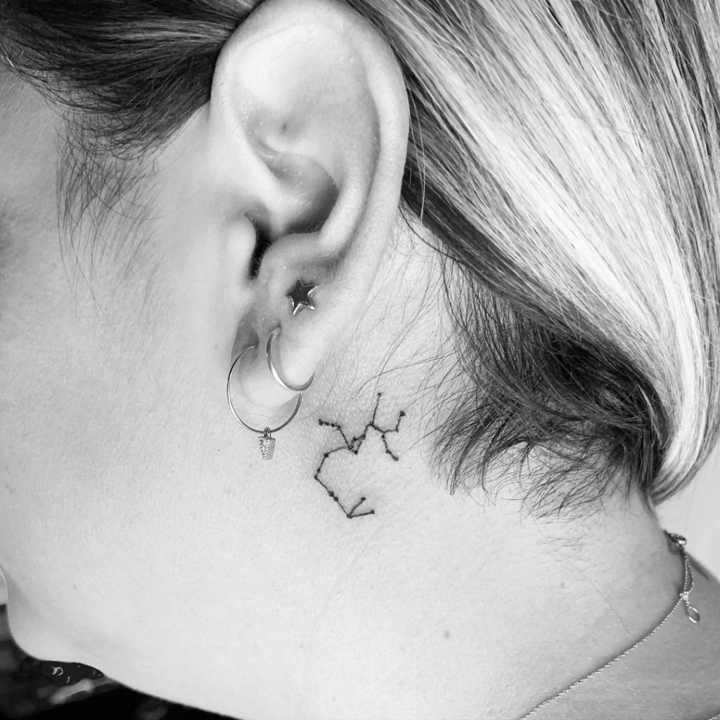 Below the ear tattoos