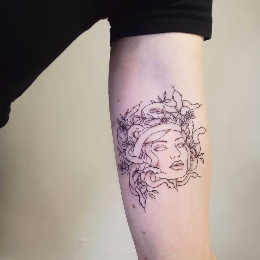 minimalist simple medusa tattoo