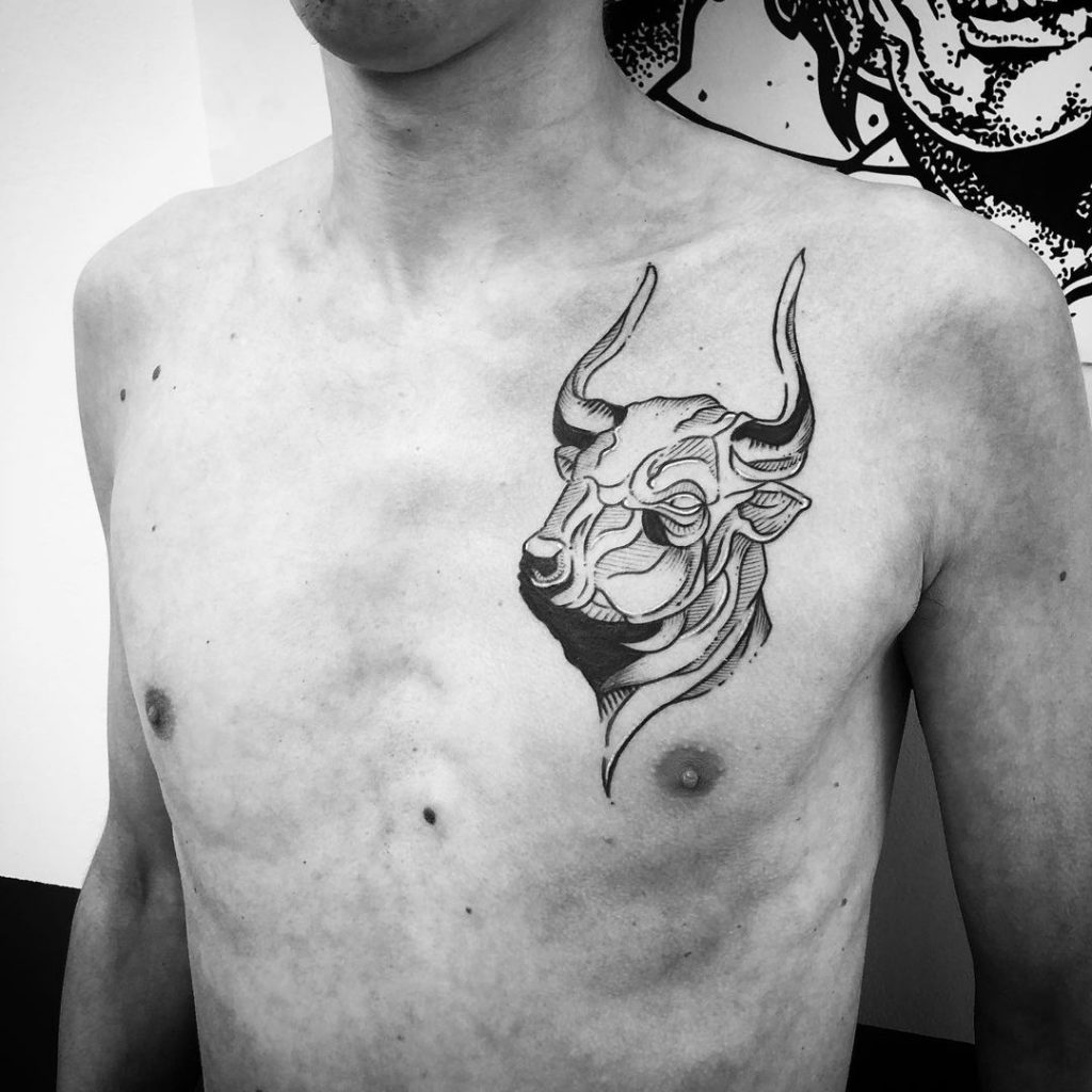 Bull on a heart tattoo