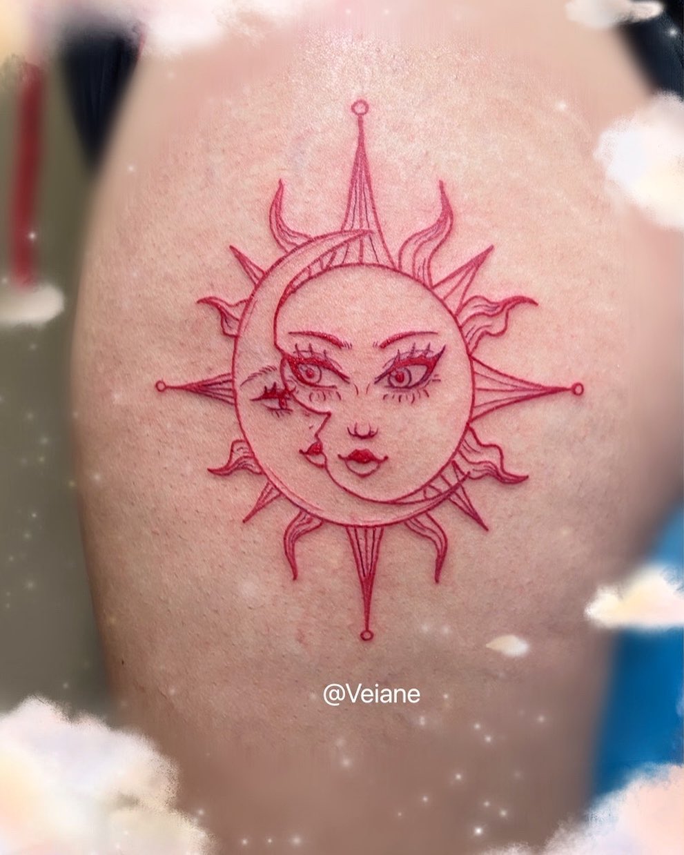 Red sun and moon tattoo