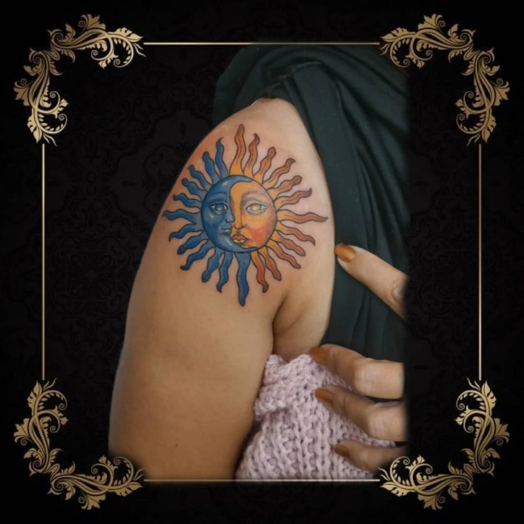 Complementary sun and moon tattoo
