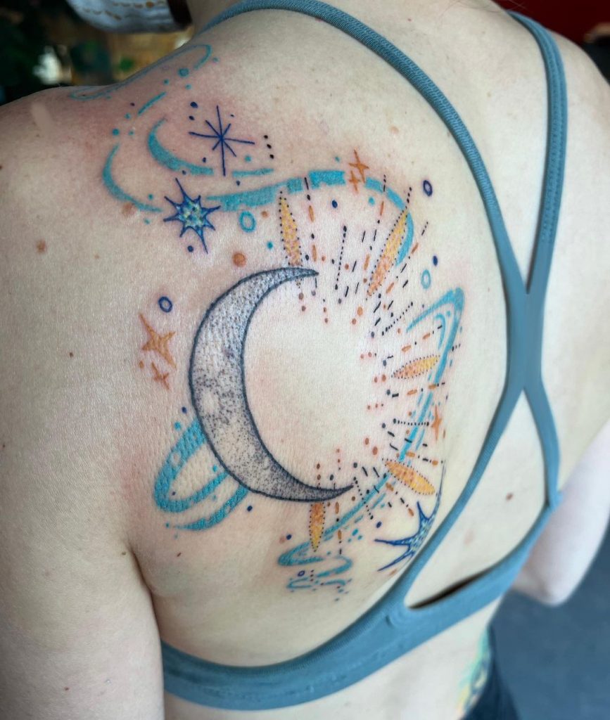 Sky tattoos on a shoulder
