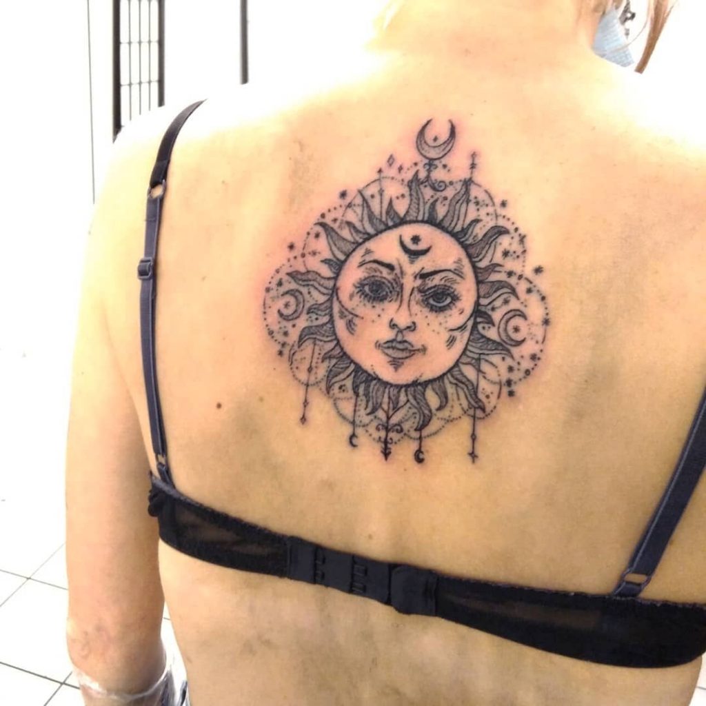 Sun body art on the back
