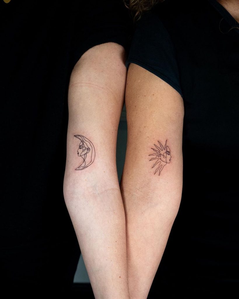 Artistic sun and moon tattoo
