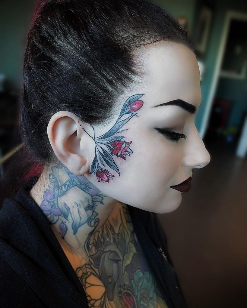 Rose face tattoos