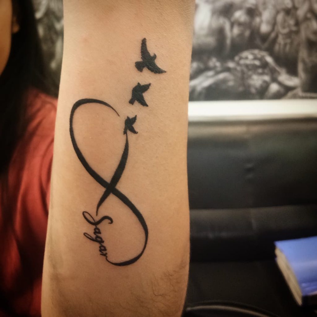 Bird migration forearm tattoos