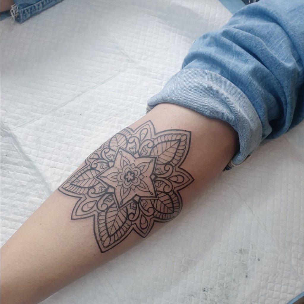 complicated flower body art