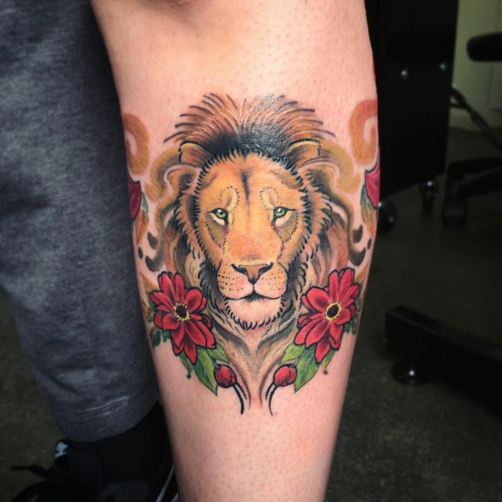 lower leg tattoos with lion