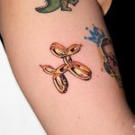 Gold Balloon Dog Tattoo