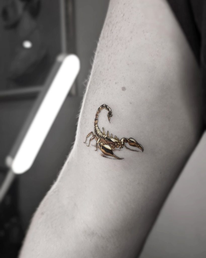 Gold Scorpion Tattoo