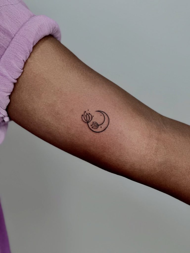 Minimal Moon and Seed Tattoo